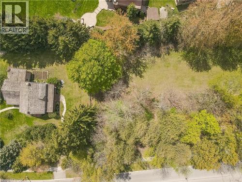 Expansive property featuring a large house, extensive green lawns, and mature trees - 630 Robert Ferrie Drive, Kitchener, ON - Outdoor With View