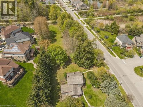 Aerial perspective showcasing a residential property with surrounding green space - 630 Robert Ferrie Drive, Kitchener, ON - Outdoor With View