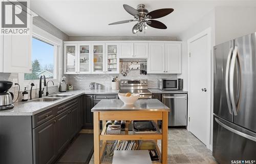 95 Schneider Crescent, Regina, SK - Indoor Photo Showing Kitchen With Double Sink