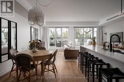 212 - 899 QUEEN STREET E Toronto, ON M4M 0C8