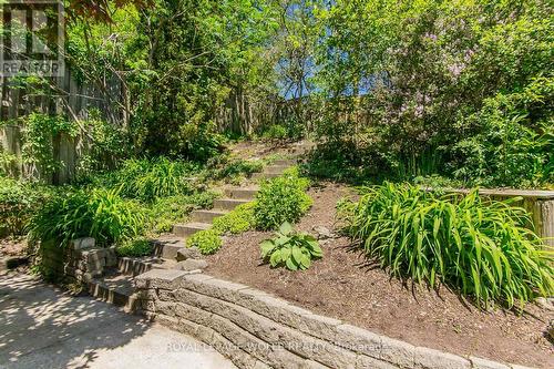Steps to a treehouse and swing - 1774 Old Mill Road, Kitchener, ON 