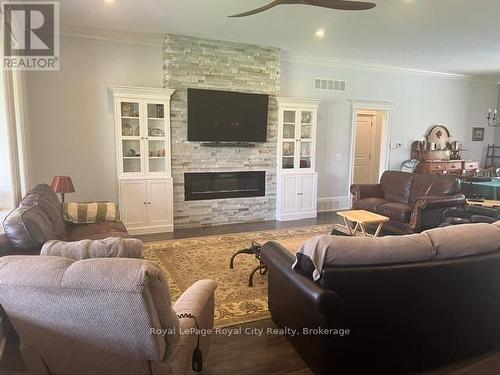 Stone FP & Wall Units Added to Living Room in 2026 - 8720 Sideroad 15 Side Road, Erin, ON - Indoor Photo Showing Living Room With Fireplace