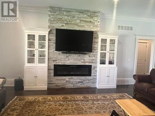 Fireplace and Wall Units Closeup - 8720 Sideroad 15 Side Road, Erin, ON - Indoor Photo Showing Living Room With Fireplace