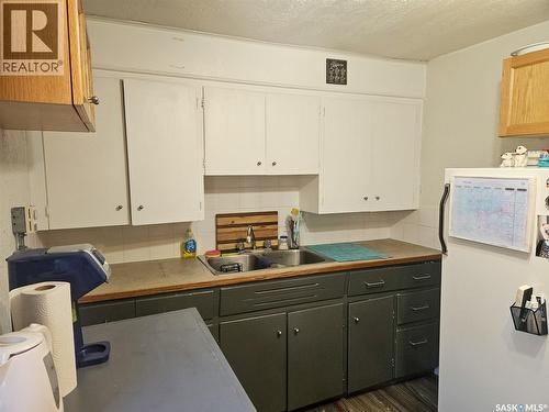 208 Wall Ridge Trail, Lac Pelletier, SK - Indoor Photo Showing Kitchen With Double Sink