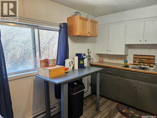 208 Wall Ridge Trail, Lac Pelletier, SK - Indoor Photo Showing Kitchen With Double Sink