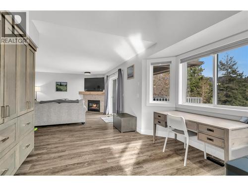Beautiful office space or breakfast nook - 3819 Glen Canyon Drive, West Kelowna, BC - Indoor With Fireplace