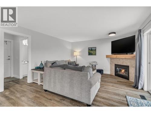 3819 Glen Canyon Drive, West Kelowna, BC - Indoor Photo Showing Living Room With Fireplace
