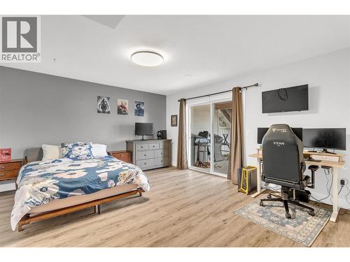 Large Bedroom or secondary rec room downstairs - 3819 Glen Canyon Drive, West Kelowna, BC - Indoor Photo Showing Bedroom