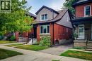 View of front featuring double brick and vinyl siding. - 156 Park Row S, Hamilton, ON  - Outdoor 