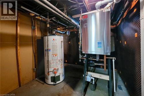 Utility room with water heater and gas fired boiler. - 156 Park Row S, Hamilton, ON - Indoor Photo Showing Basement