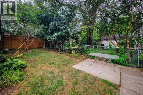 Fenced backyard featuring a patio area - 156 Park Row S, Hamilton, ON - Outdoor