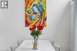 White brick accent wall providing textural interest - 