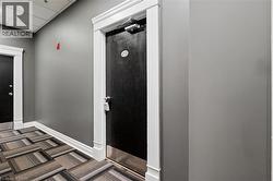 Contemporary hallway with gray painted walls - 