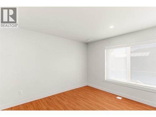 Bedroom 1 on lower level - 2090 Bennett Road, Kelowna, BC - Indoor Photo Showing Other Room