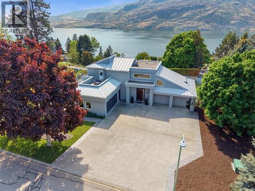 Backyard oasis with a separate pool shed to store equipment - 2090 Bennett Road, Kelowna, BC - Outdoor With In Ground Pool