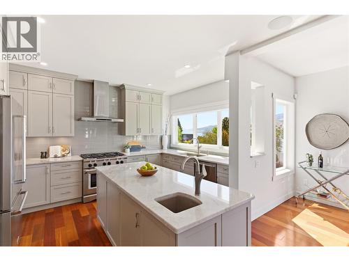 Fully updated kitchen on the main floor with plenty of room to cook gourmet meals and hang out with friends and family - 2090 Bennett Road, Kelowna, BC - Indoor Photo Showing Kitchen With Upgraded Kitchen