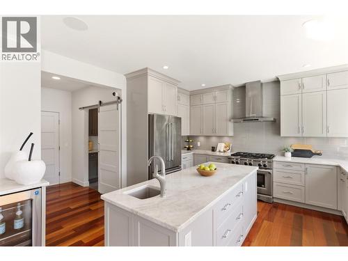 Fully updated kitchen with large windows to take in the lake views - 2090 Bennett Road, Kelowna, BC - Indoor Photo Showing Kitchen With Upgraded Kitchen