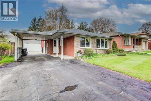 18 Queenston Crescent, Kitchener, ON - Outdoor With Facade