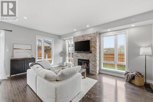 375 Cooks Mill Crescent, Ottawa, ON - Indoor Photo Showing Living Room With Fireplace