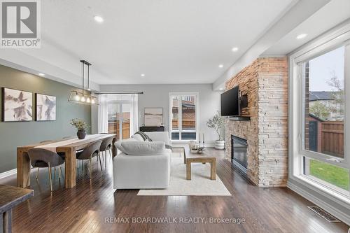 375 Cooks Mill Crescent, Ottawa, ON - Indoor Photo Showing Living Room With Fireplace