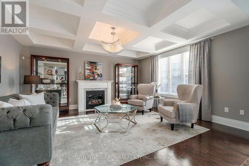 8 Chapel Gully Trail, King, ON - Indoor Photo Showing Living Room With Fireplace