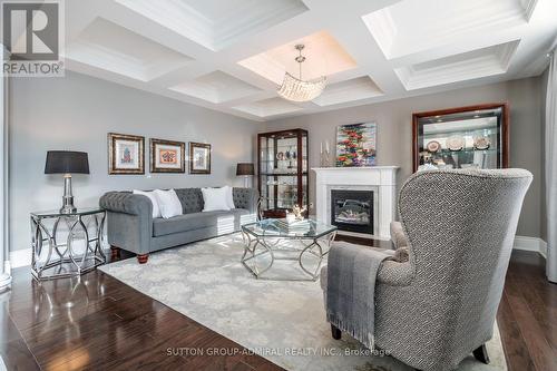 8 Chapel Gully Trail, King, ON - Indoor Photo Showing Living Room With Fireplace