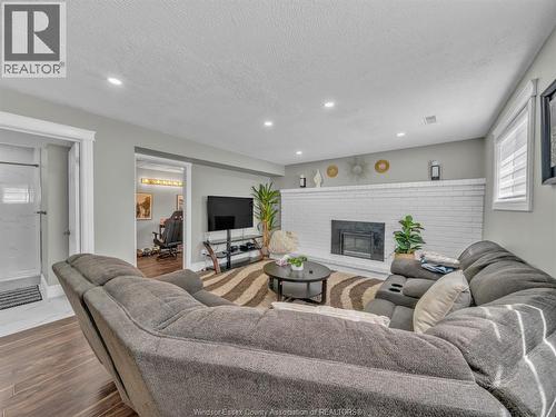 3474 Deerbrook, Windsor, ON - Indoor Photo Showing Living Room With Fireplace