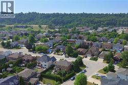 Residential community featuring diverse architectural styles and mature landscaping - 