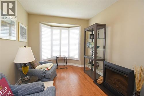 320 Hamilton Drive Unit# 4, Ancaster, ON - Indoor Photo Showing Living Room With Fireplace