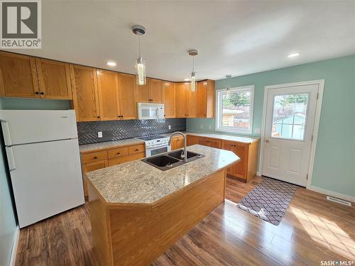 25 Rhodes Street, Redvers, SK - Indoor Photo Showing Kitchen With Double Sink
