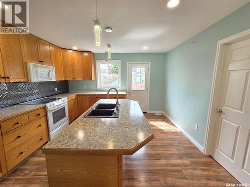 25 Rhodes Street, Redvers, SK - Indoor Photo Showing Kitchen With Double Sink