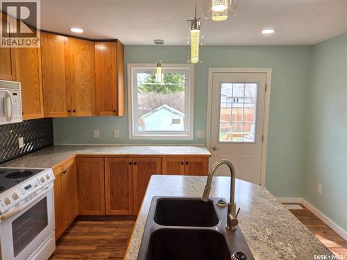 25 Rhodes Street, Redvers, SK - Indoor Photo Showing Kitchen With Double Sink