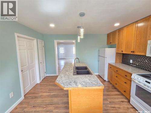 25 Rhodes Street, Redvers, SK - Indoor Photo Showing Kitchen With Double Sink