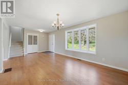 Entryway and Stairs to Bedrooms - 