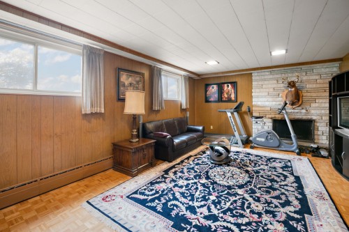 Salle familiale - 926 Rue Marlatt, Montréal (Saint-Laurent), QC - Indoor With Fireplace