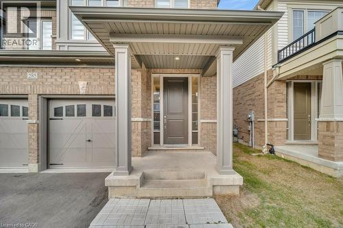 Entrance to property with a garage and brick siding - 285 Broadacre Drive, Kitchener, ON - Outdoor