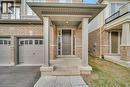 Entrance to property with a garage and brick siding - 285 Broadacre Drive, Kitchener, ON  - Outdoor 