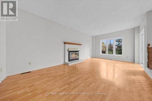 1841 Thistleleaf Crescent, Ottawa, ON - Indoor Photo Showing Living Room With Fireplace