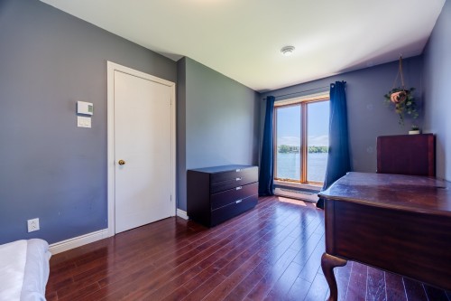 Chambre à coucher - 10 Rue Mercier, Montréal (L'Île-Bizard/Sainte-Geneviève), QC - Indoor Photo Showing Bedroom