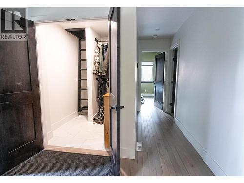 Entry Cupboard with Kids nook/storage up the ladder - 2552 Sandstone Mews, Invermere, BC 
