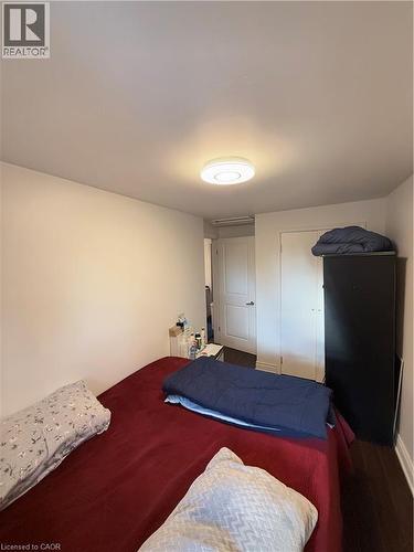 Neutral wall paint and wood-finish flooring define this space - 181 Thaler Avenue, Kitchener, ON 