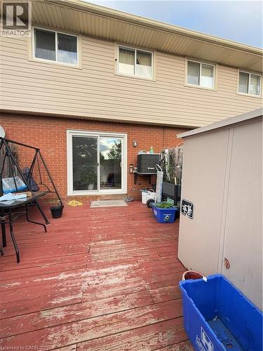 Expansive outdoor deck area featuring a sliding glass door entry - 181 Thaler Avenue, Kitchener, ON 