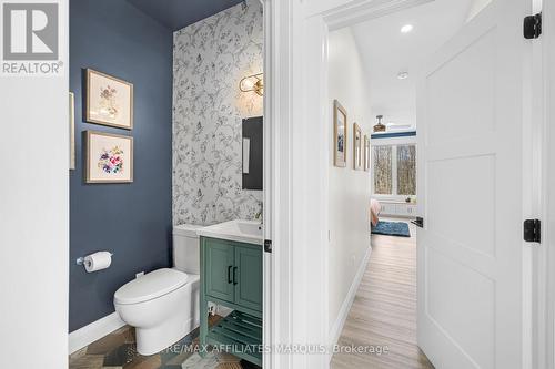 Stylish powder room tucked away - 4421M Old Kingston Road, Rideau Lakes, ON 