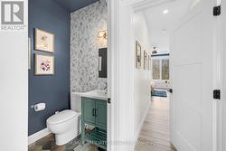 Stylish powder room tucked away - 