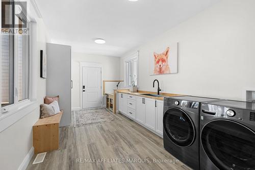 Mudroom with dog wash station & laundry - 4421M Old Kingston Road, Rideau Lakes, ON 