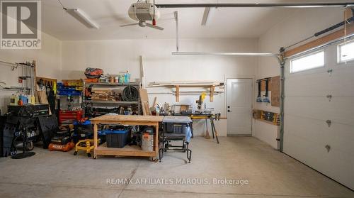 Double car garage plus a 3rd bay through the door - 4421M Old Kingston Road, Rideau Lakes, ON 