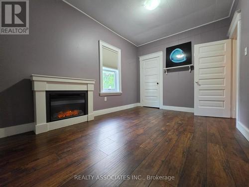 486289 30Th Side Road, Mono, ON - Indoor Photo Showing Other Room With Fireplace