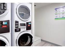 Coin Laundry just steps down the hall from the unit - 