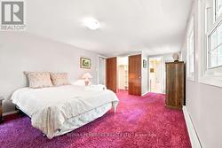 Walk-in closet in primary bedroom - 