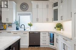 Kitchen with lots of upper cabinets - 
